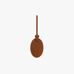 Butterscotch | Front view of Monos x Reformation Luggage Tag in Butterscotch color