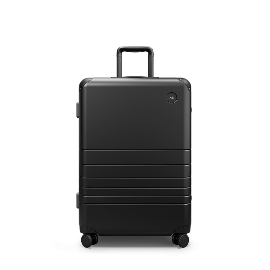 Obsidian Scaled | Front view of Hybrid Check-In Medium in Obsidian