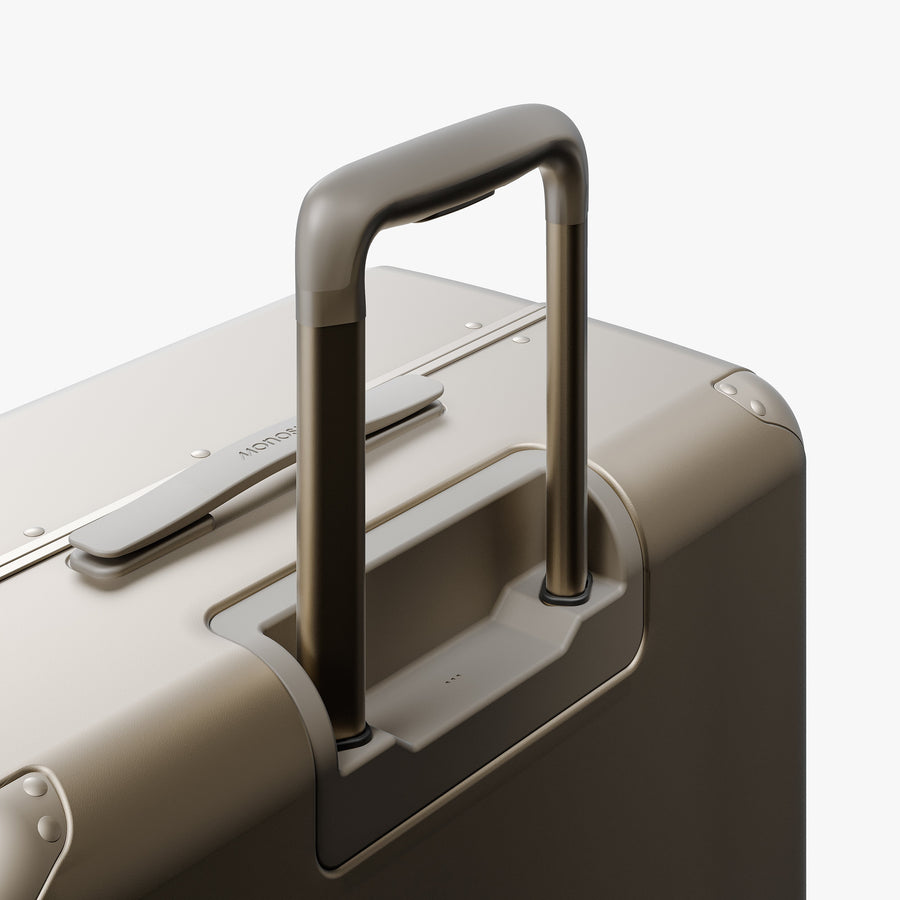 Champagne | Extended luggage handle view of Hybrid Check-In Large in Champagne