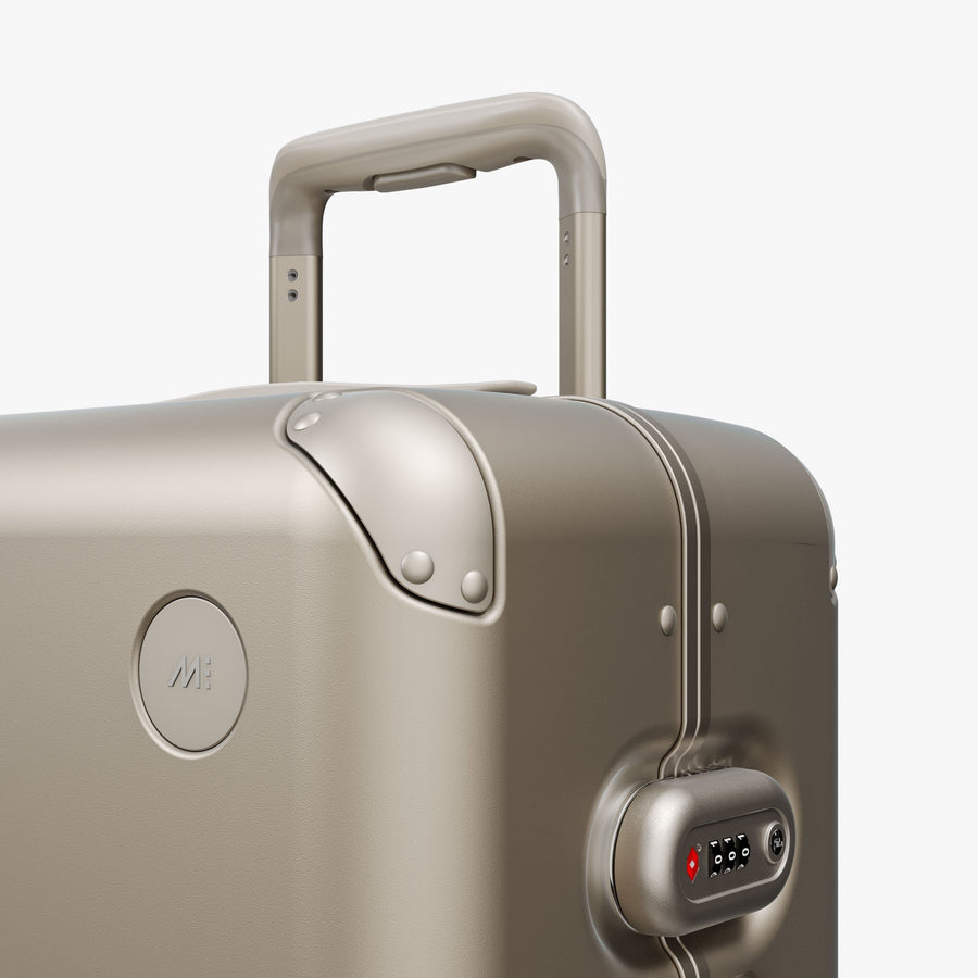 Champagne | Luggage handle view of Hybrid Carry-On Plus in Champagne