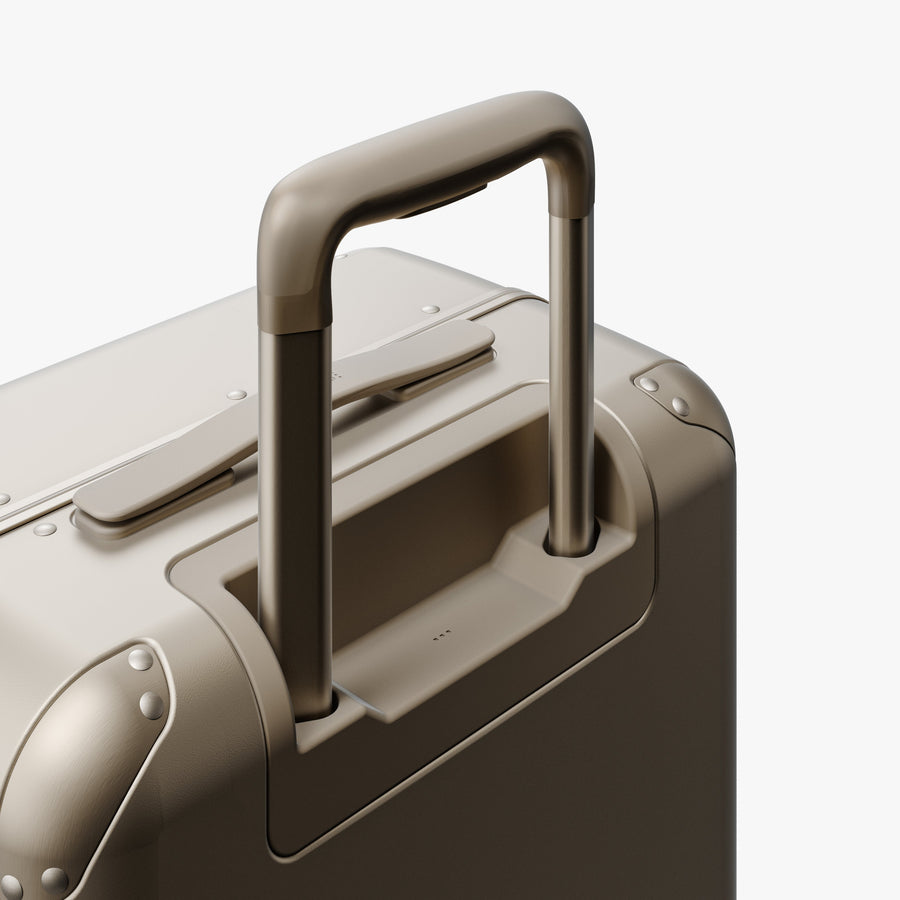 Champagne | Extended luggage handle view of Hybrid Carry-On Plus in Champagne