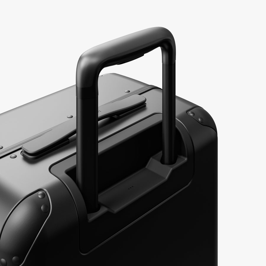 Obsidian | Extended luggage handle view of Hybrid Carry-On Plus in Obsidian