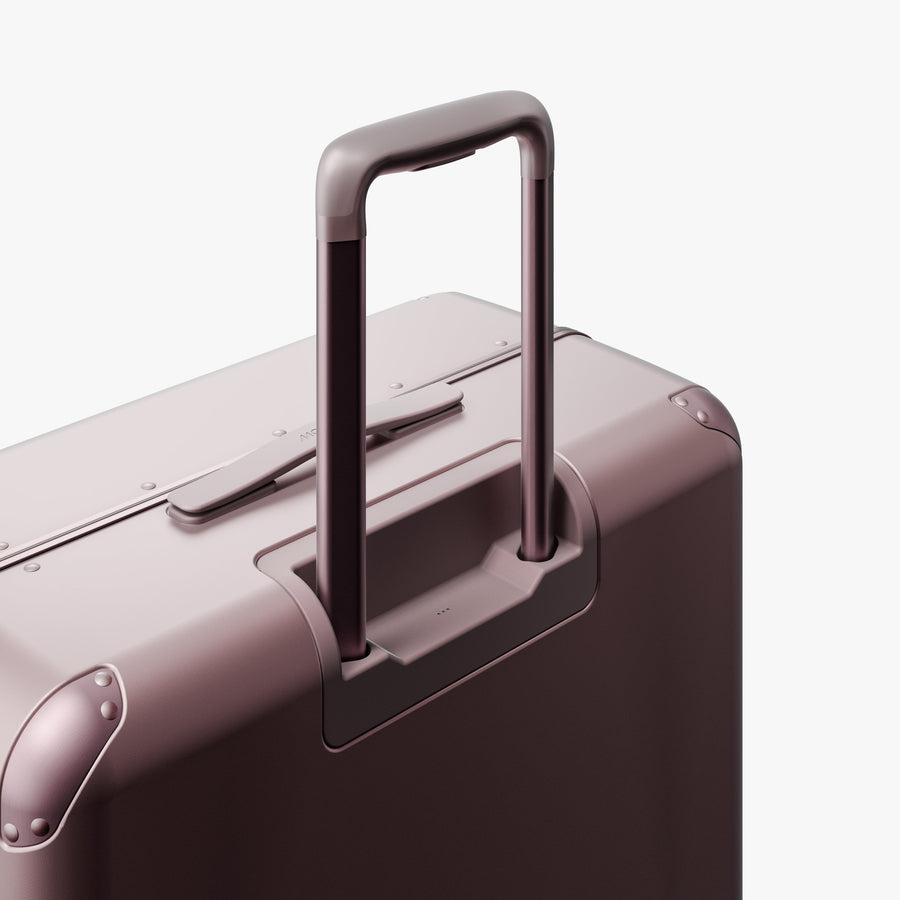 Orchid | Extended luggage handle view of Hybrid Check-In Large in Orchid