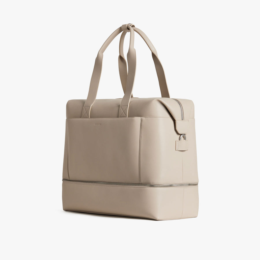 Ivory (Vegan Leather) | Angled view of Metro Weekender in Ivory