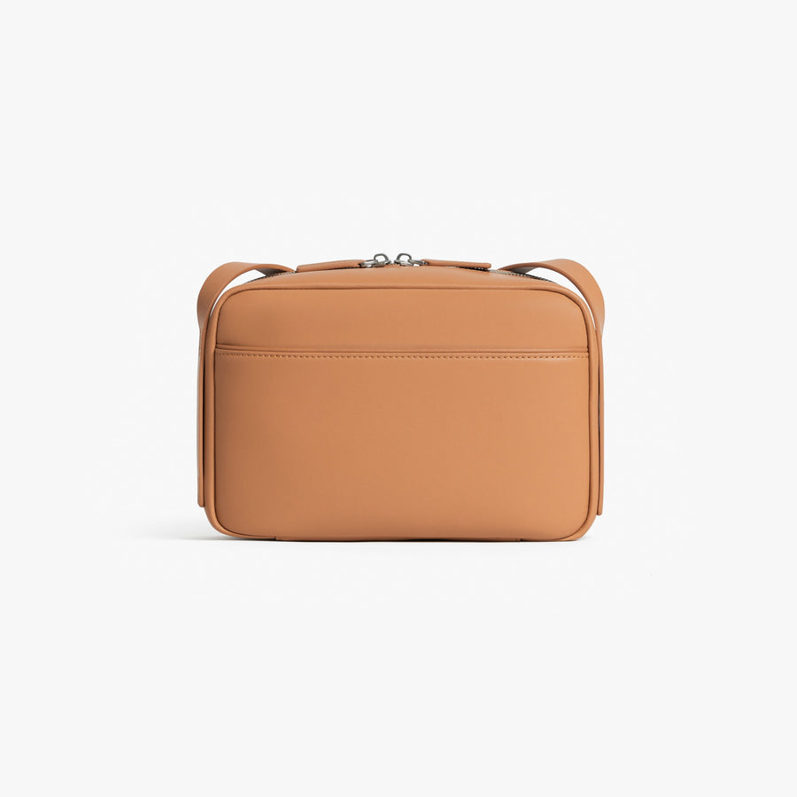 Saddle Tan (Vegan Leather) | Back view of Metro Crossbody Saddle Tan