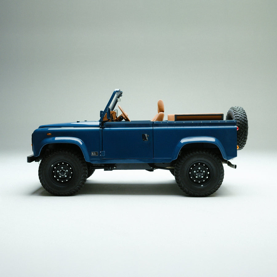 Arles Blue | Side view of Land Rover Defender in Arles Blue