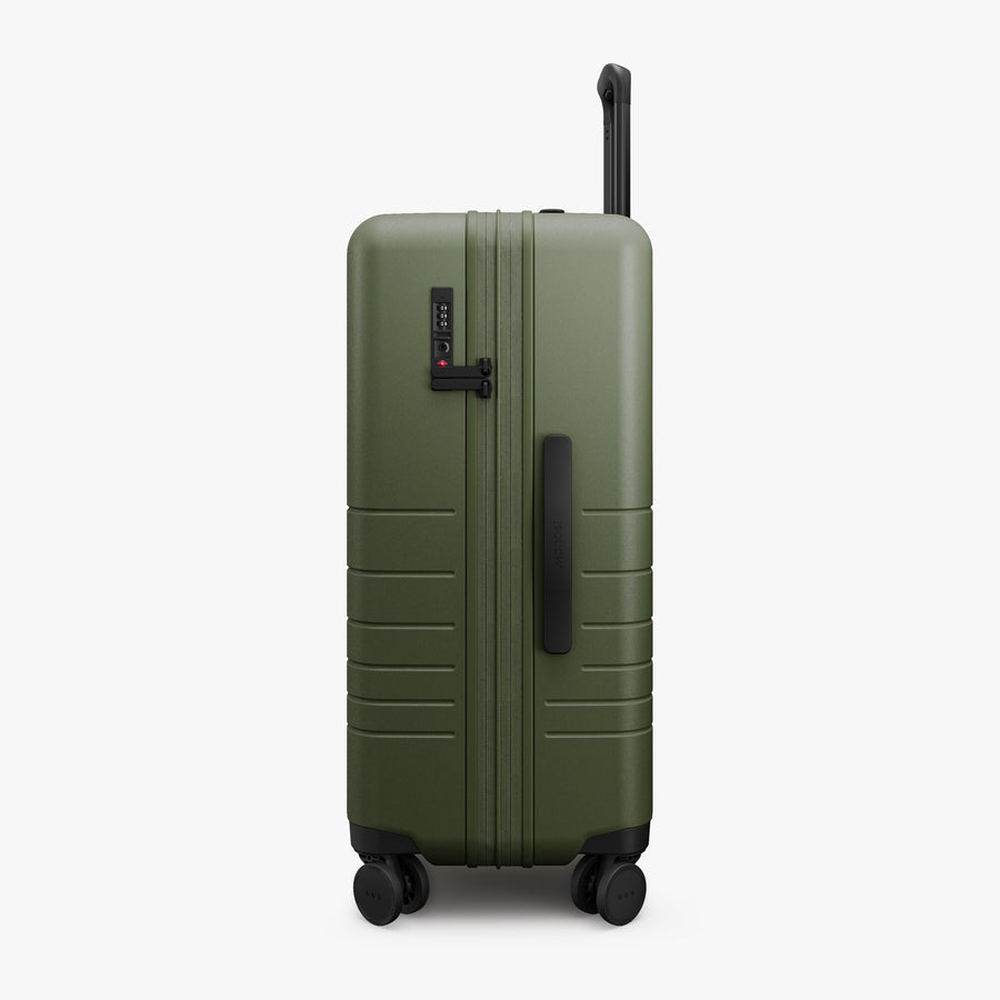 Olive Green | Side view of Expandable Check-In Medium in Olive Green