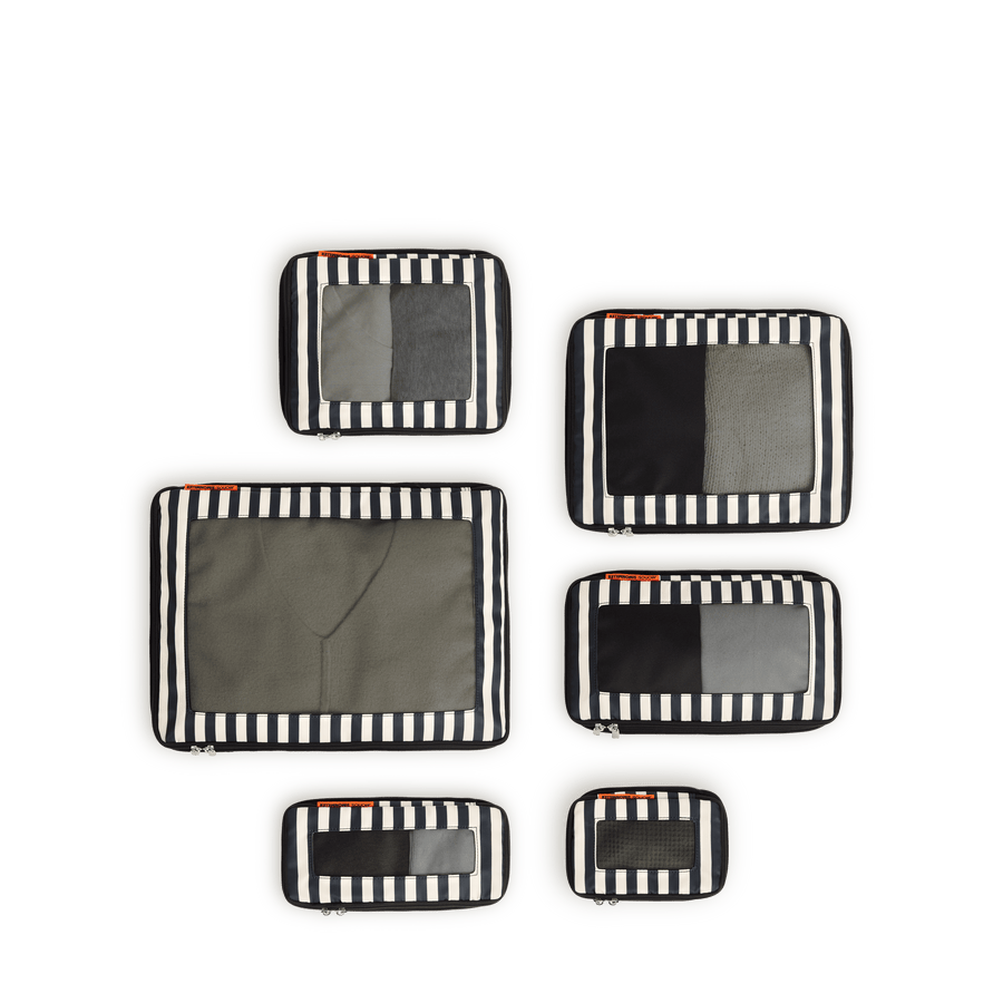 Set of Six / Poplin Stripe Black Scaled | Set of four Poplin Stripe Black compressible packing cubes arranged flat to show all sizes