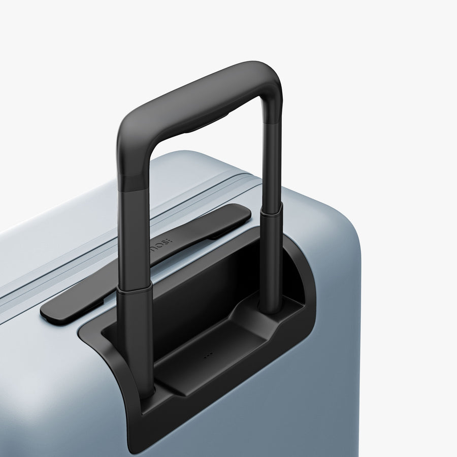 Blue Haze | Extended luggage handle view of Carry-On Pro Plus in Blue Haze