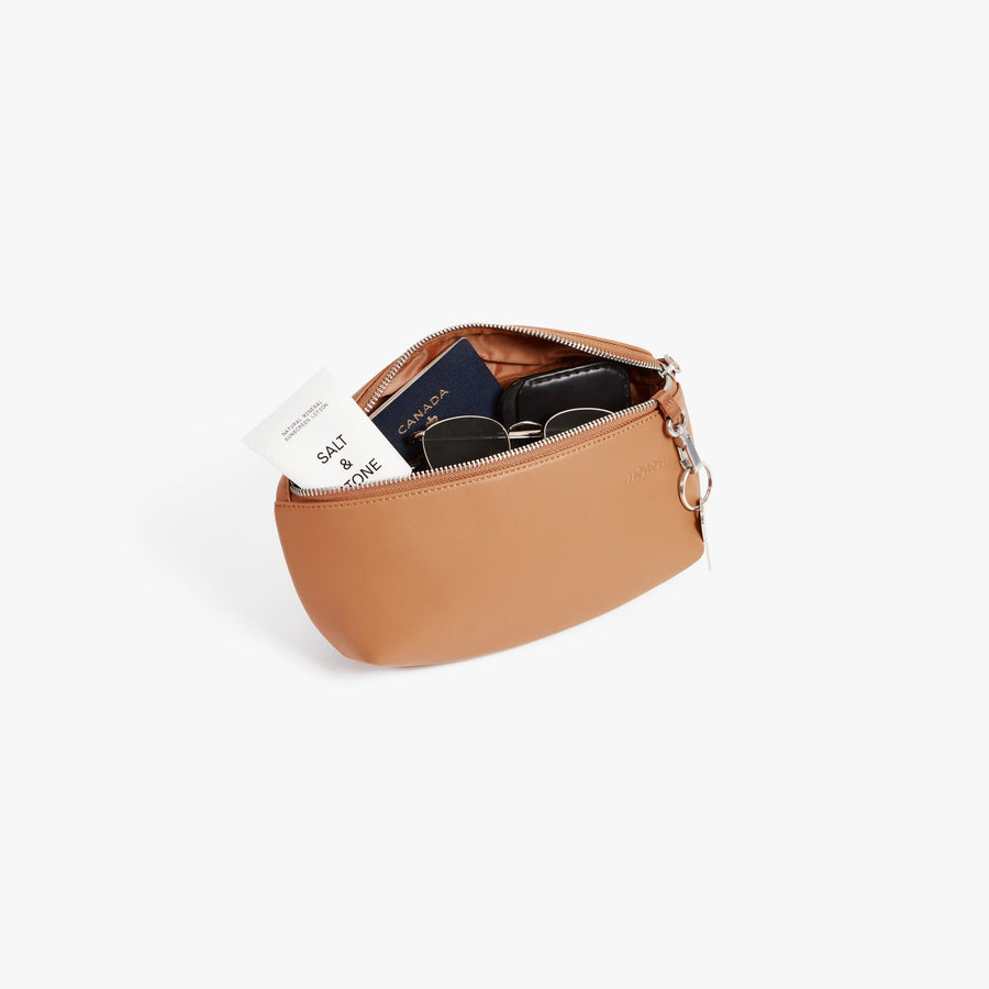 Saddle Tan (Vegan Leather) | Open view of Metro Sling in Saddle Tan